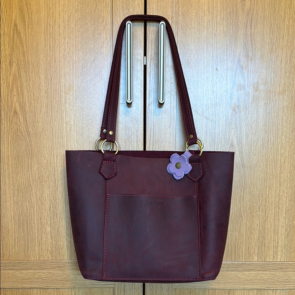Portland Leather Market Tote in the color “Merlot” with Flower